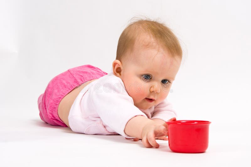 Little child baby and red cup