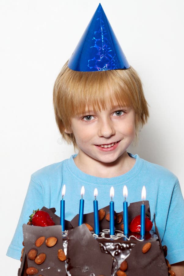 Little child with cap and cake