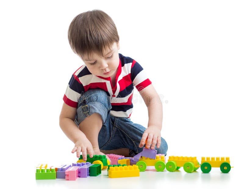 Little child with construction set over white stock image Little child with construction set over white stock image
