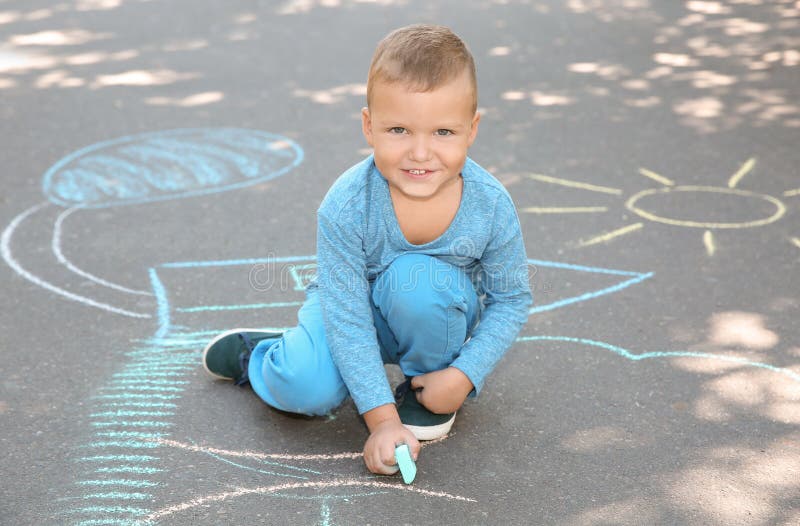 Little Child Drawing with Colorful Chalk Stock Image - Image of ...