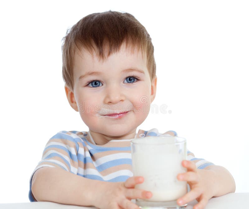 Little child drinking yogurt over white