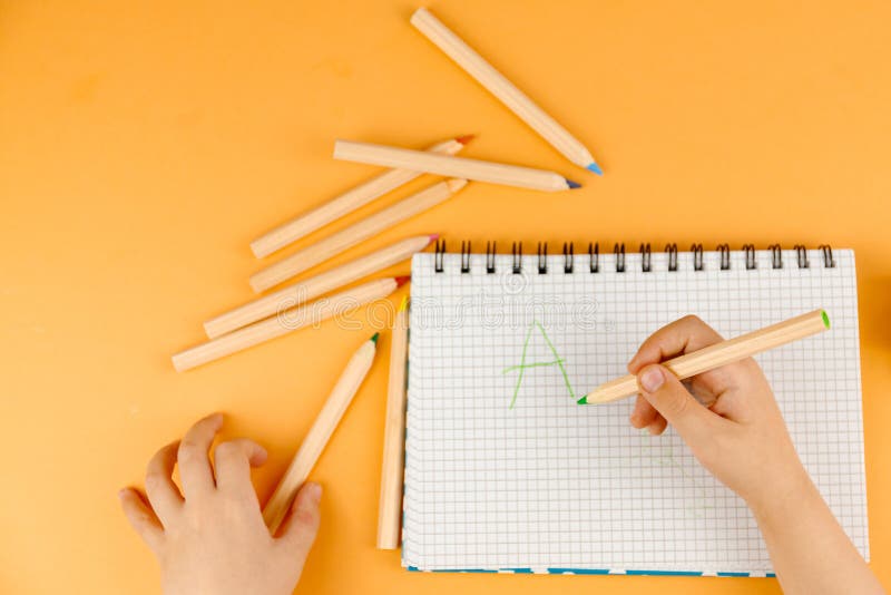 Little Child Hand Drawing on the Paper Stock Photo Image of child