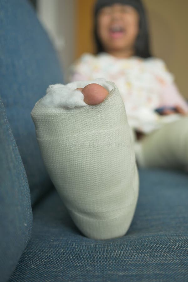 Little Child with Plaster Bandage on Leg. Stock Image Image of