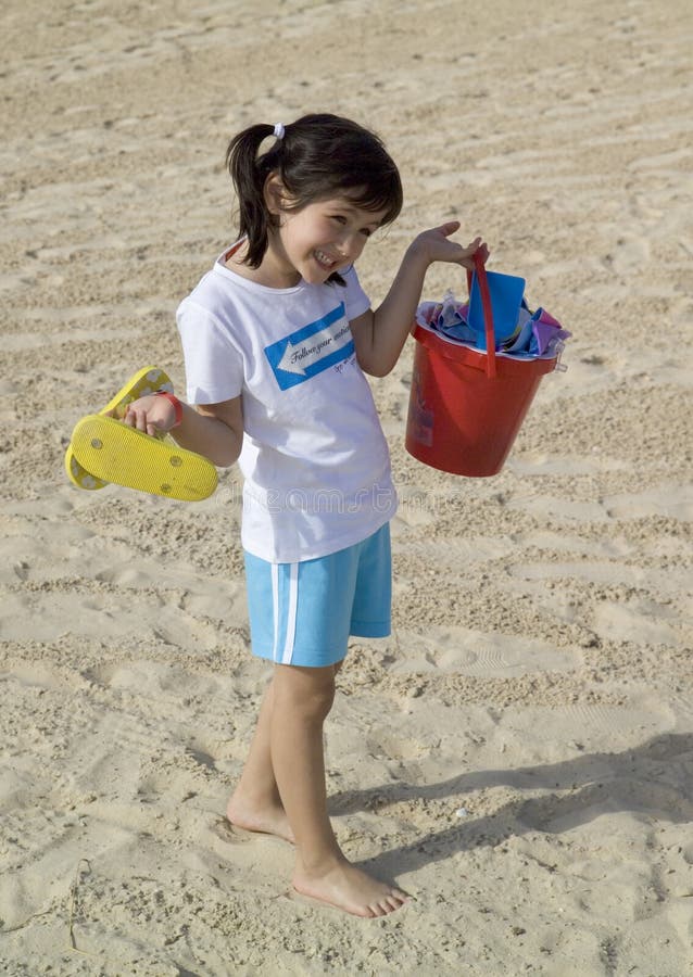 Little child play with sand