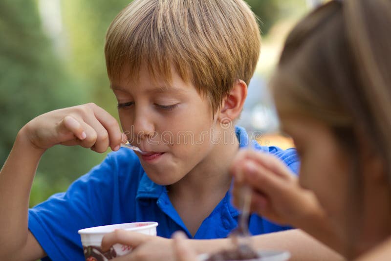 Little Children Eating Icecream Stock Image Image of portrait, cafe 27440081