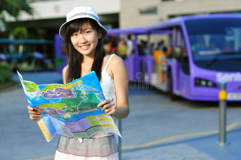 Little Chinese Asian Tourist Girl with map