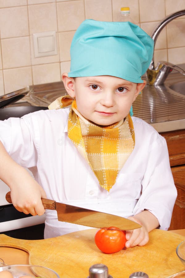 Little Cook with Knife and Tomato Stock Photo Image of cute, little