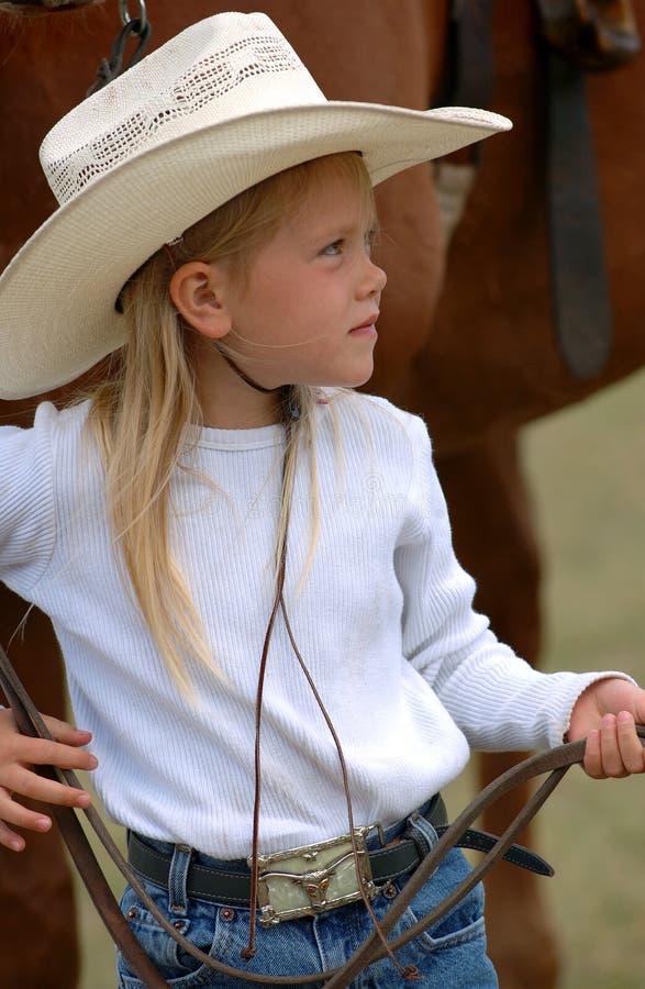 Little Cowgirl Holding Reins