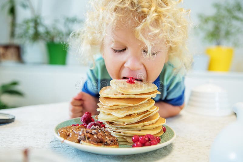 127 Sweet Little Caucasian Boy Eating Pancakes Stock Photos - Free ...