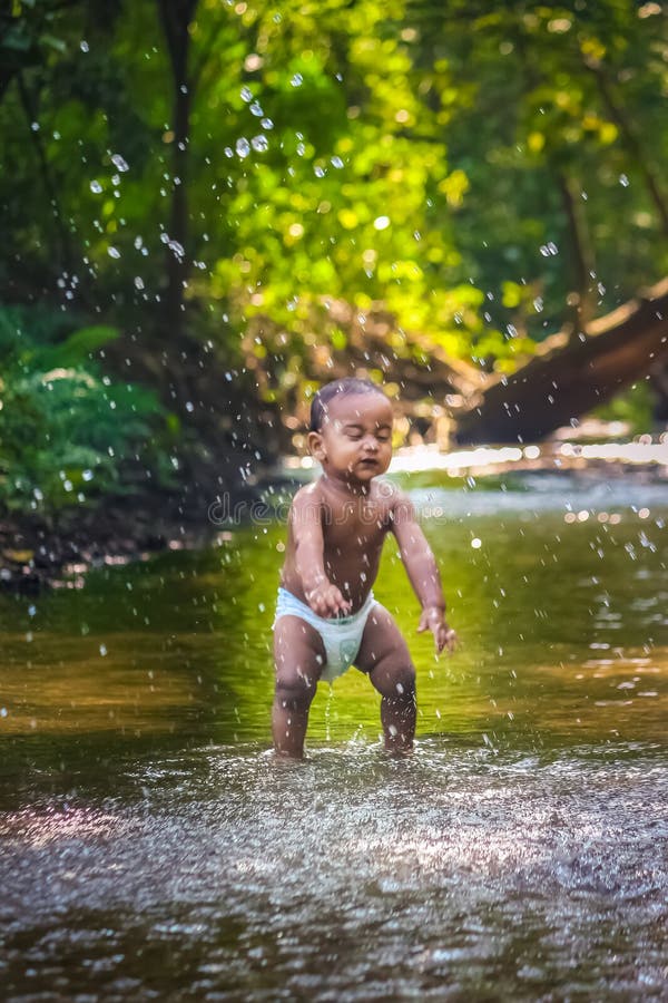 Little Cute Baby Boy Playing in River Water. Portrait of Boy Child Having  Fun and Joy on a Forest River Stock Photo - Image of outside, green:  207183568