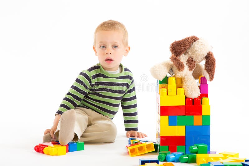 Little Cute Boy Playing With Building Blocks Isolated On White Stock