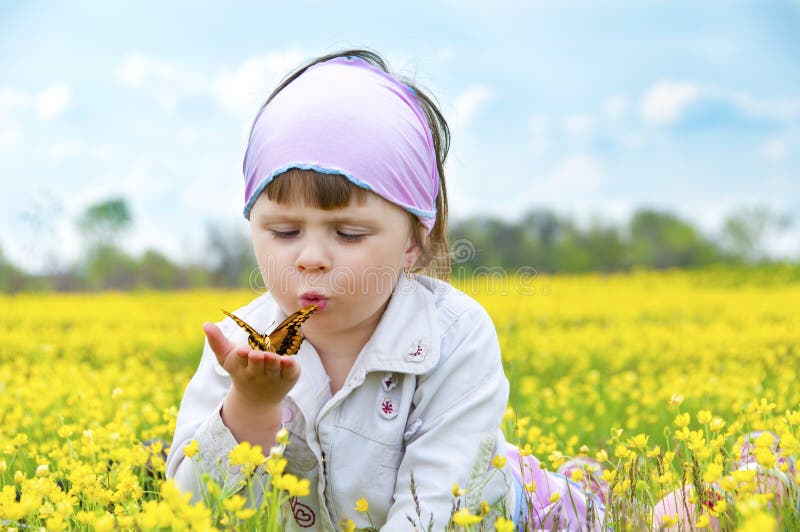 Little cute girl with a butterfly.