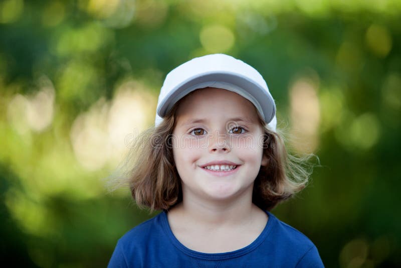 Little Cute Girl with a Cap in the Park Stock Photo Image of adorable