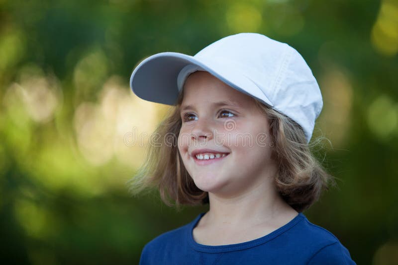 Little Cute Girl with a Cap in the Park Stock Photo Image of little