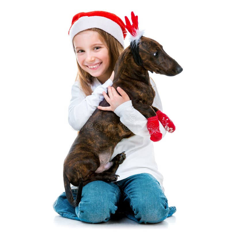 Little cute girl with a dachshund