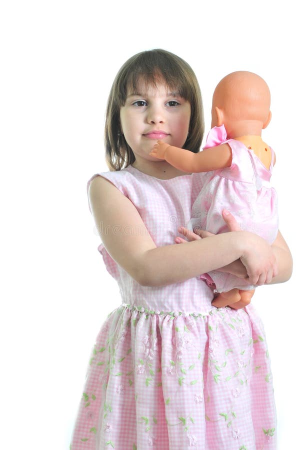 Little cute girl with doll
