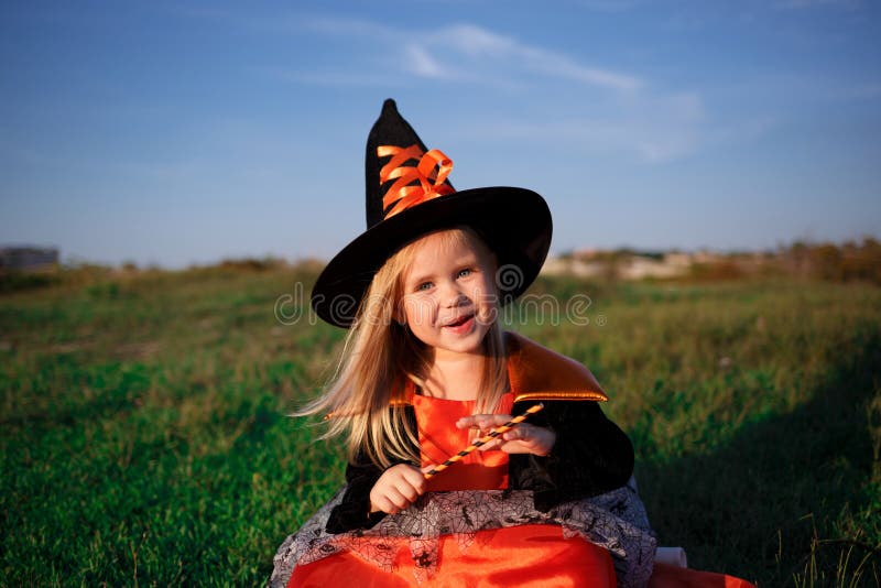 Little Cute Girl Dressed As a Witch Celebrates Halloween Stock Photo ...