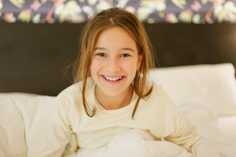 Little Cute Girl Smiling while in Her Bed Stock Photo Image of hotel