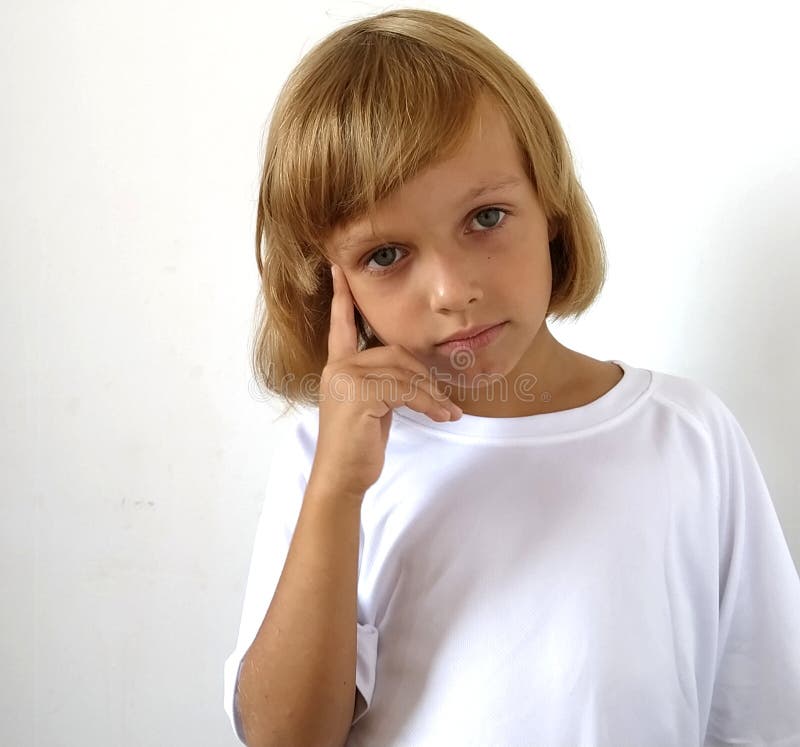 A Little Cute Girl 6-7 Years Old Wants To Sleep. a Child with Tanned Skin  and White Hair. White T-shirt. Copy Space Stock Photo - Image of closeup,  caucasian: 196799376