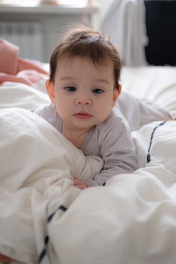 Little Cute Infant Baby Portrait in Gender Neutral Clothes Smiling ...