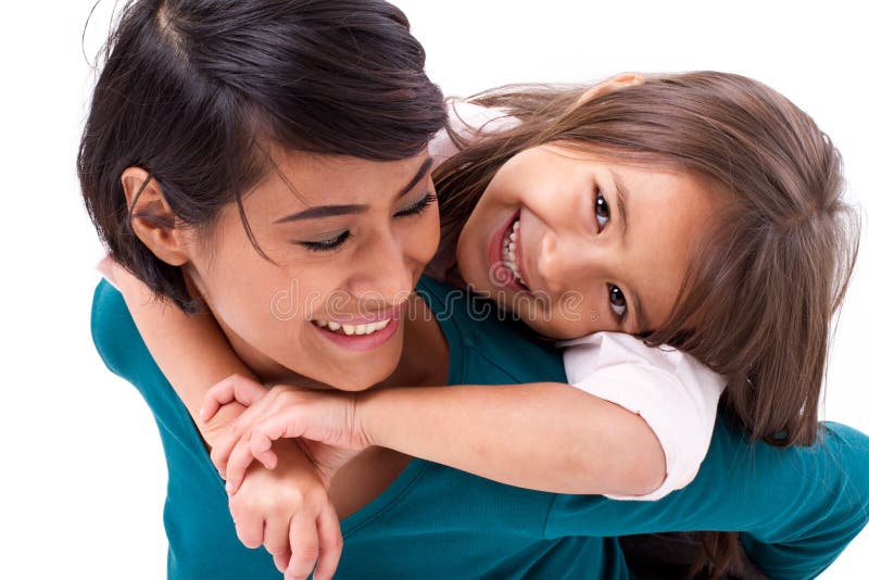 Little daughter hugging her mother, concept of happy family or l royalty free stock image Little daughter hugging her mother, concept of happy family or l royalty free stock image
