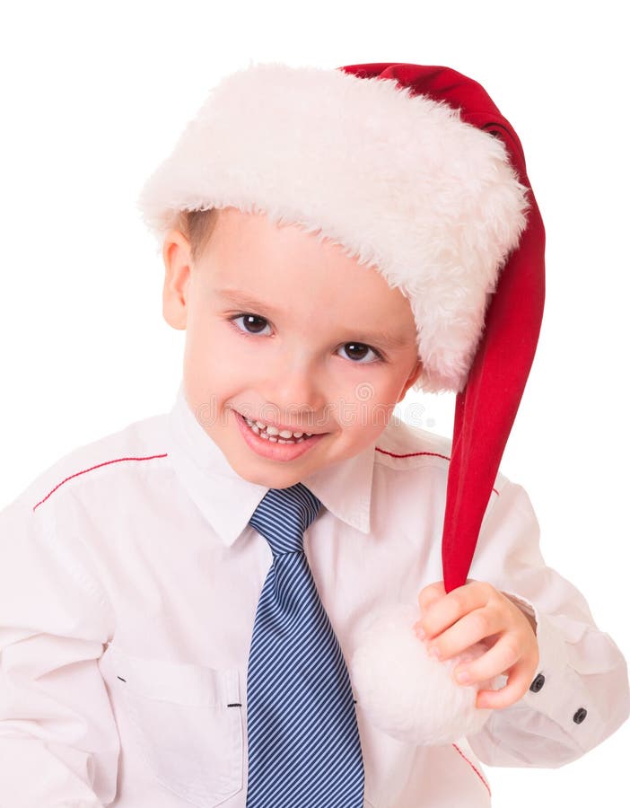 Little funny boy in red santa hat stock photos Little funny boy in red santa hat stock photos
