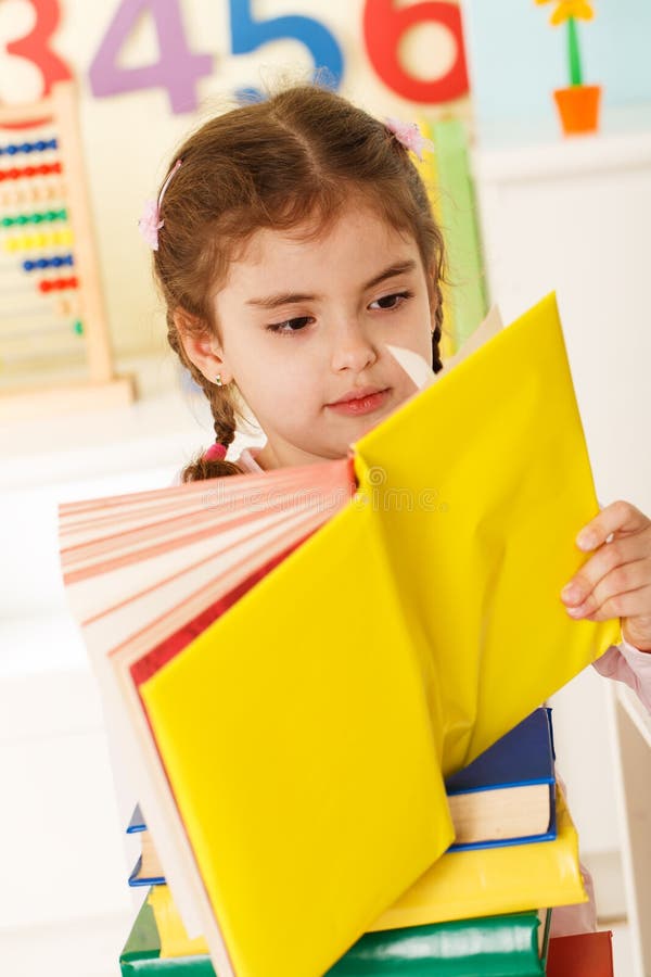 Little genius with yellow book