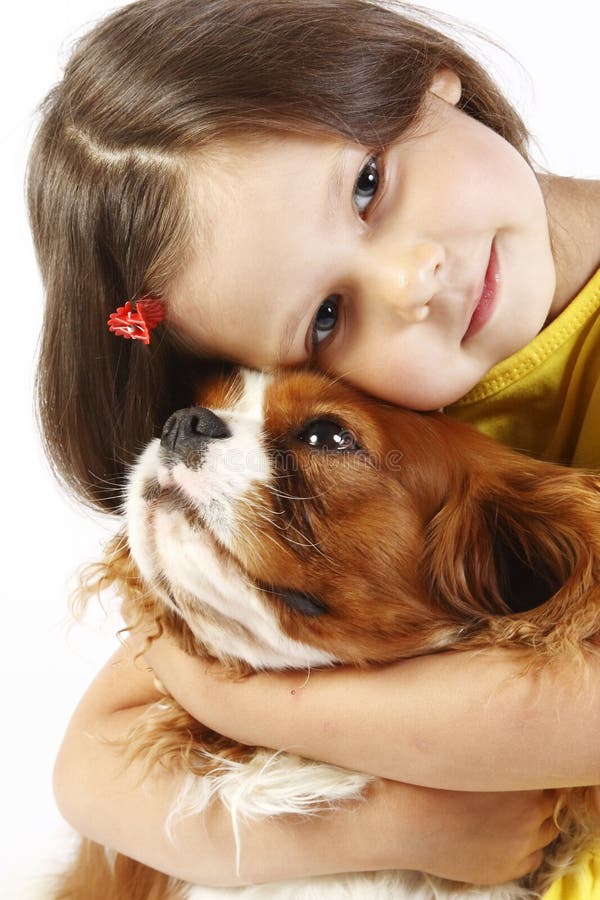 little girl 5 years old and the dog isolated