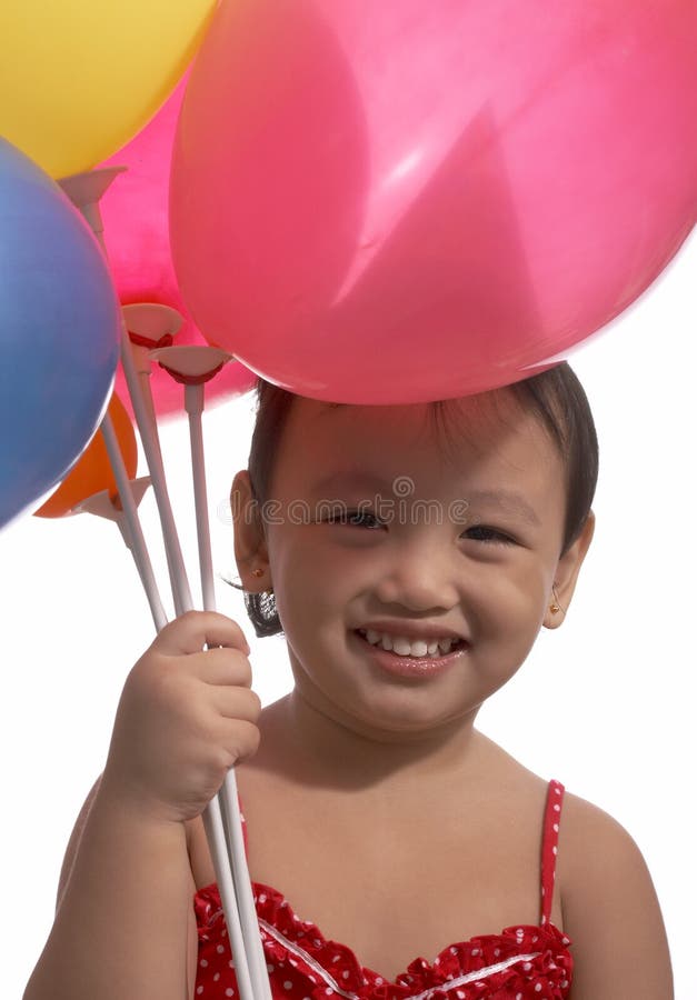 Little girl with balloons