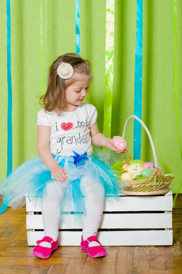 Little Girl with Basket with Easter Eggs Stock Image Image of