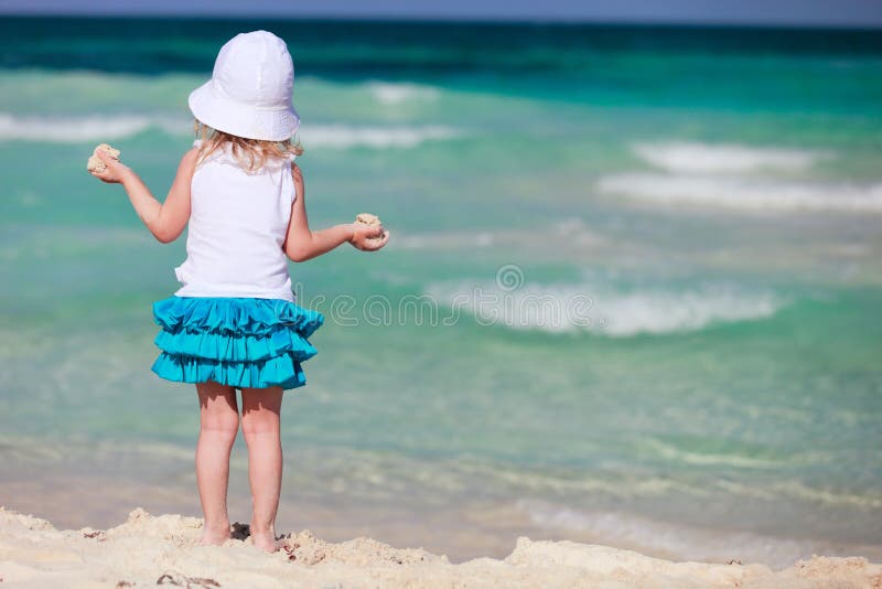 Little girl at beach stock image. Image of seashore, sand - 22283041