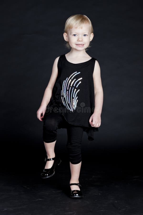 Little Girl in Black Clothes Stock Photo Image of blonde, positive