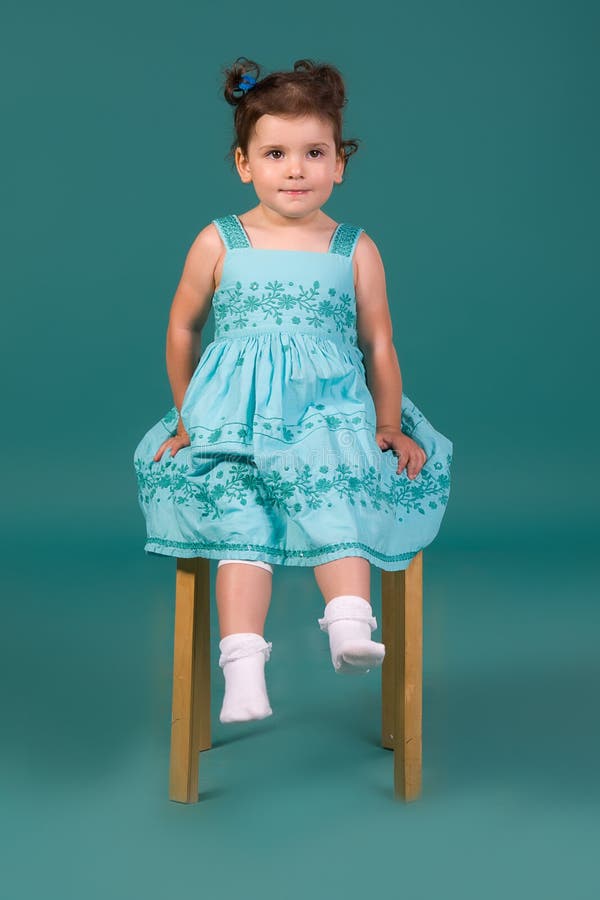 Little girl in blue dress