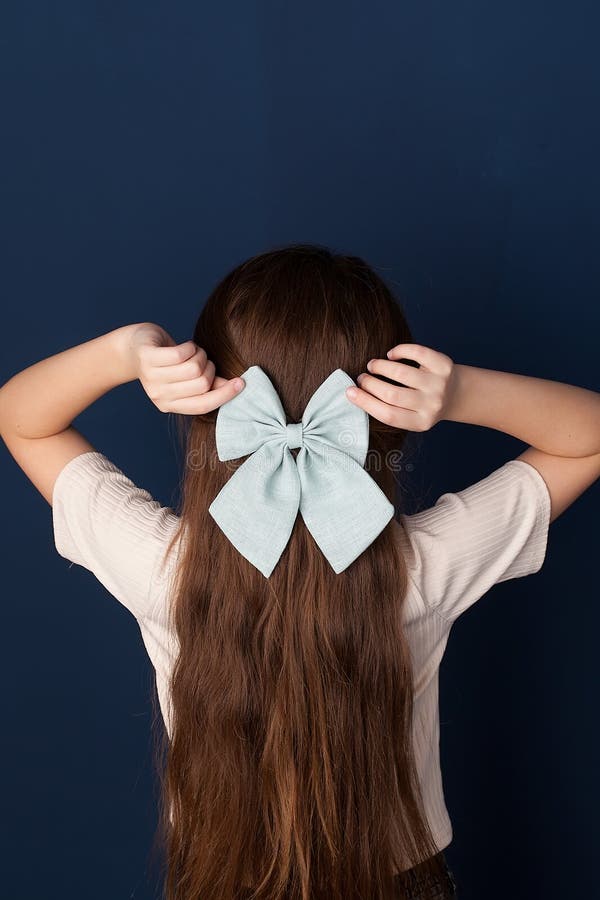 Little Girl with a Bow in Her Hair. Stock Image Image of blond