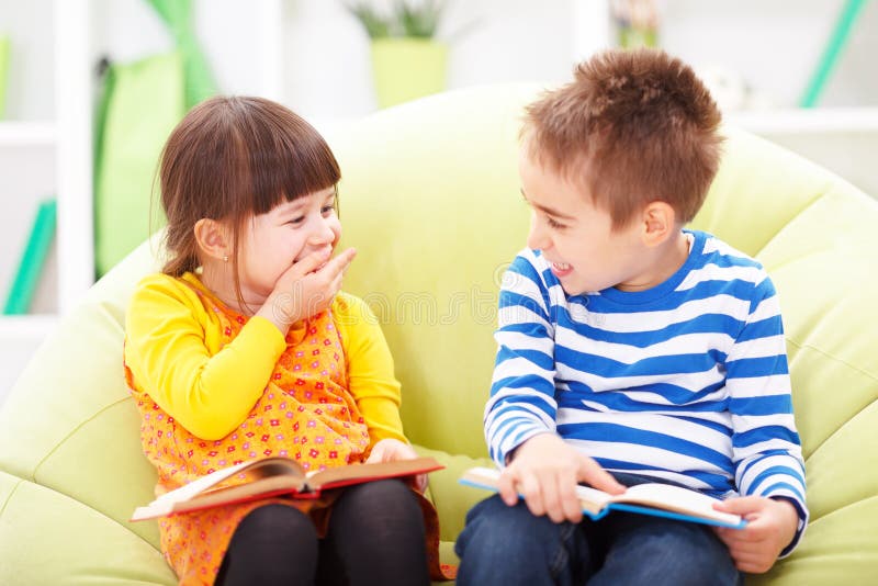 Little Girl And Boy Reading And Laughing Stock Image Image Of Read