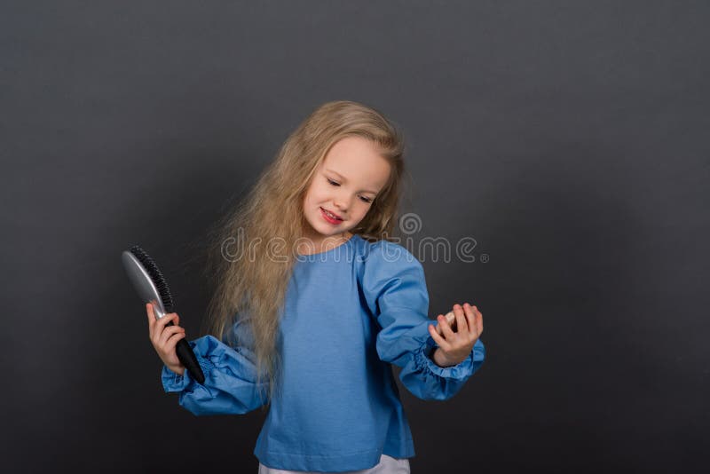 Little Girl Brushes Her Tangled Hair after a Shower Stock Photo - Image ...