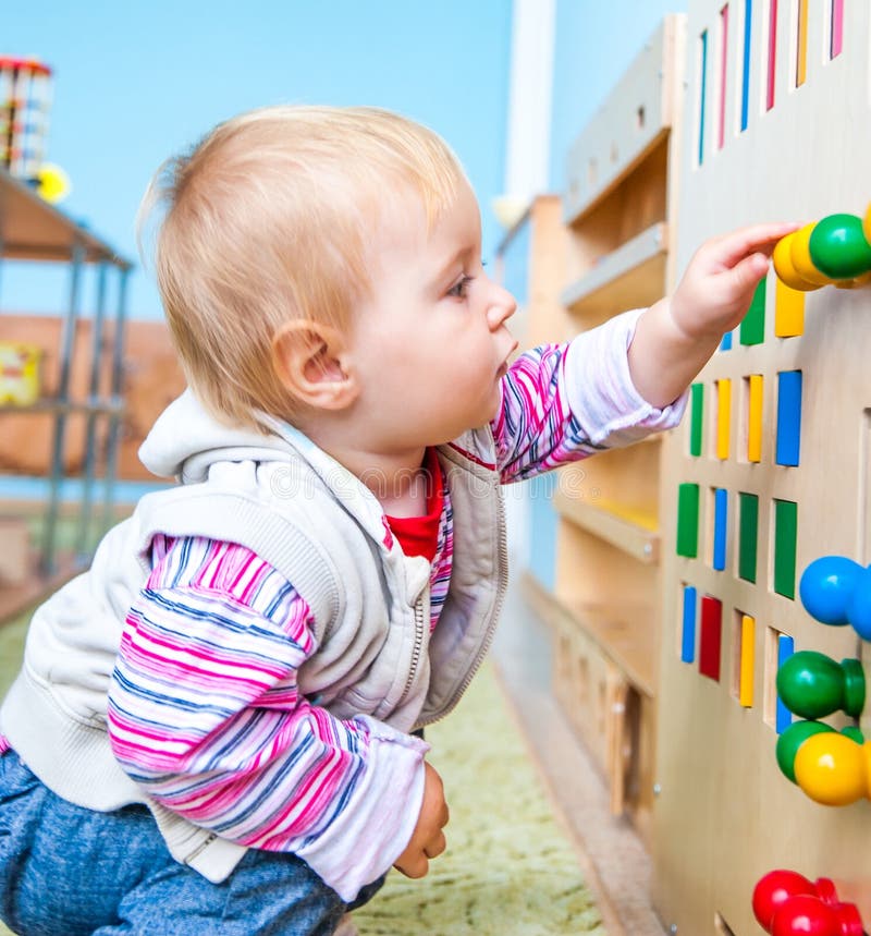 Little girl in the classroom early development