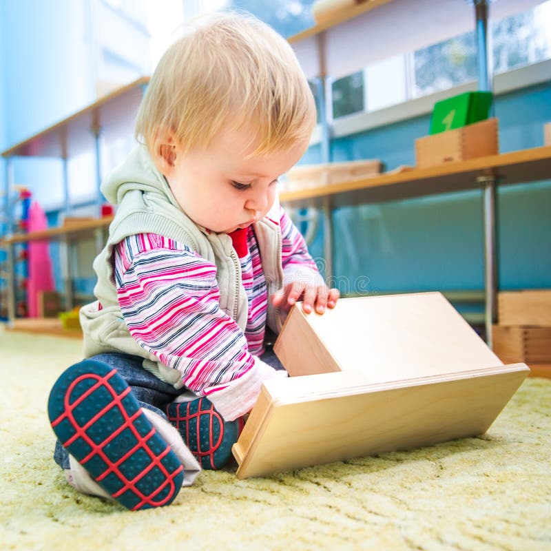 Little girl in the classroom early development