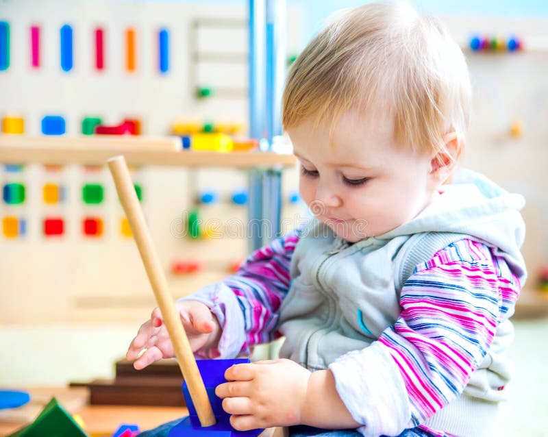 Little girl in the classroom early development