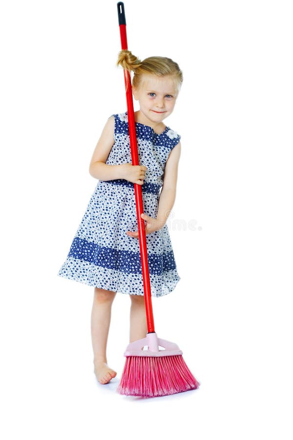 Little girl cleaning with broom