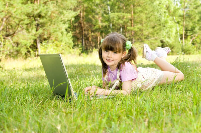 Little girl with computer