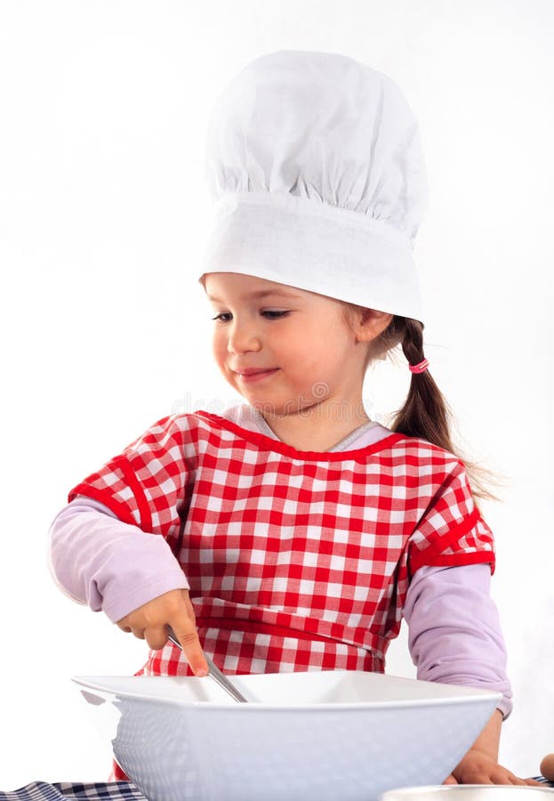 Little girl in the cook costume