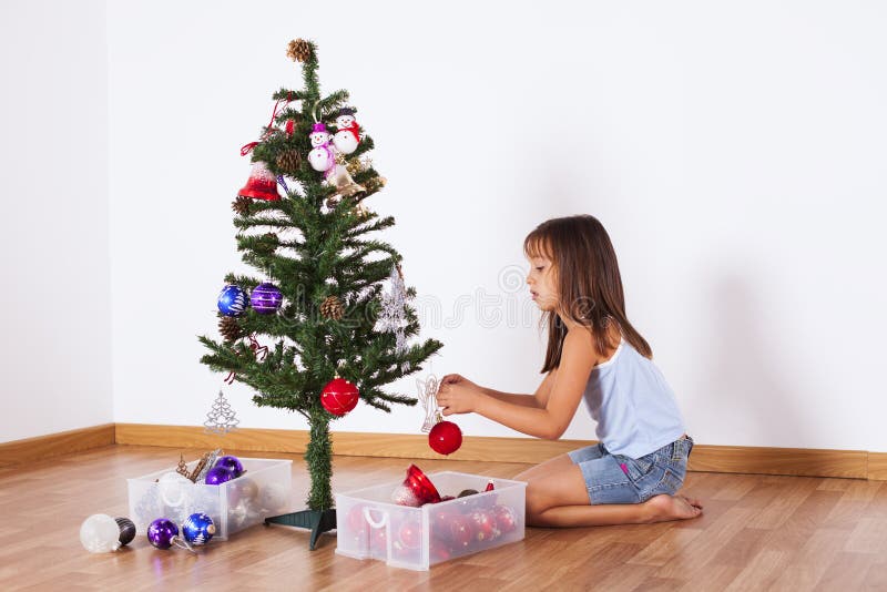 Little Girl Decorating a Christmas Tree Stock Photo Image of cute