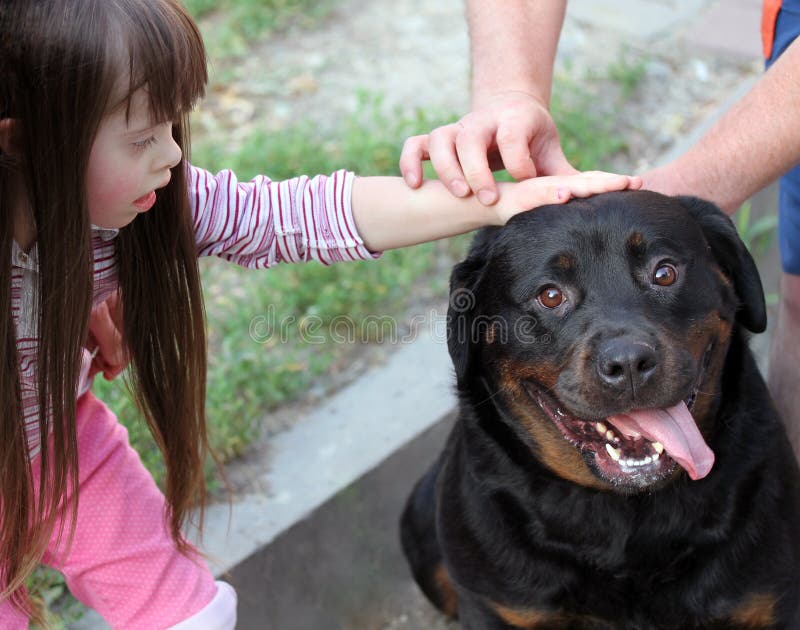 Little girl with a dog