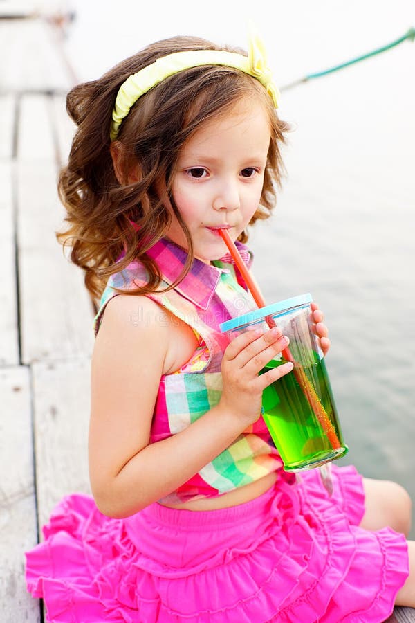 Little Girl Drinking Sparkling Water Pier Stock Photos Free & Royalty