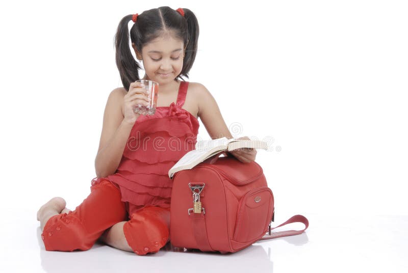 Little girl drinking water