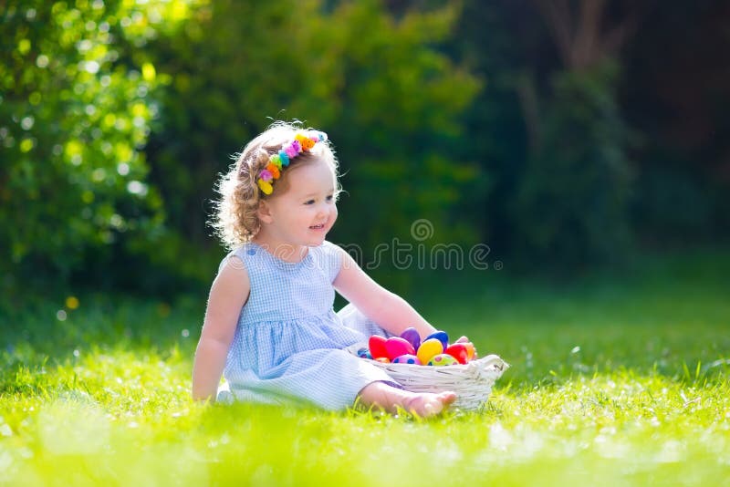 Little girl on Easter egg hunt