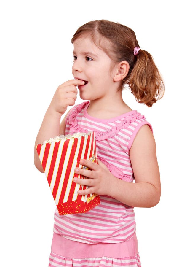 Little girl eat popcorn stock image. Image of funny, food 29440489