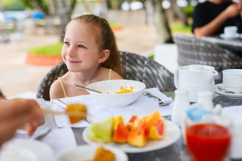 Little girl eating breakfast