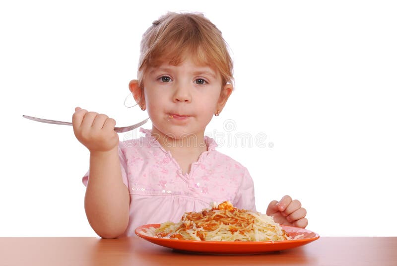Little girl eating spaghetti